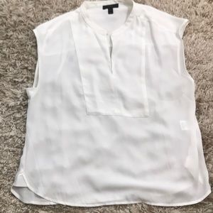 J crew petite blouse with a split neck and a button on top.